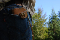 Carrying a wallet in your back pocket may be bad for your health, warns a chiropractor.